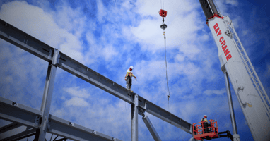 Steel crews erecting a hyperscale data center frame